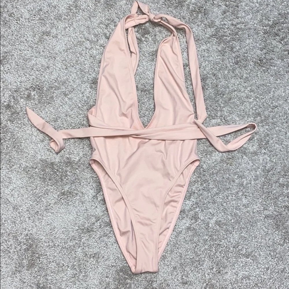 Blush colored one piece swimsuit